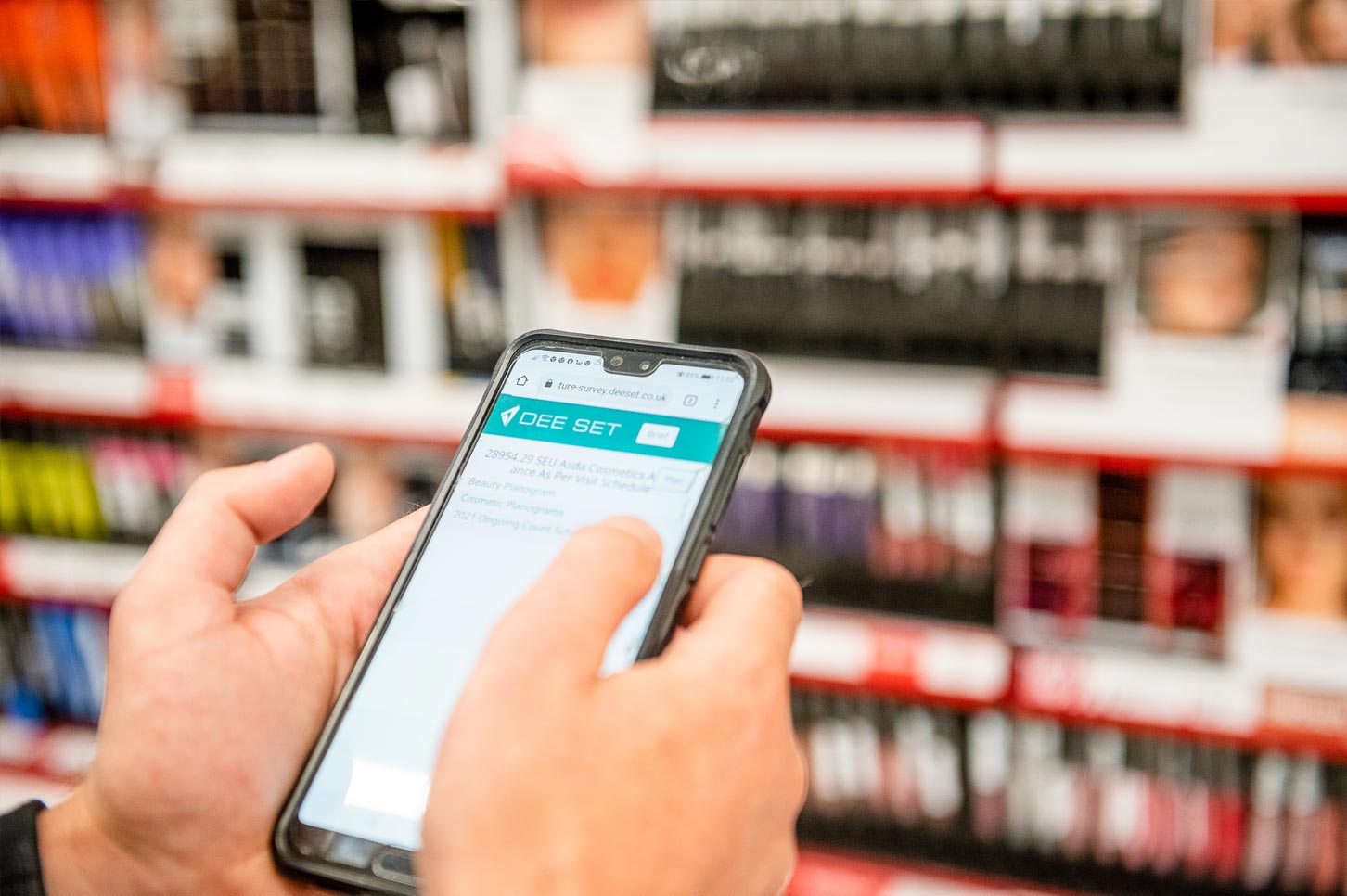 An image of a mobile phone being used in-store to collect prodcut data